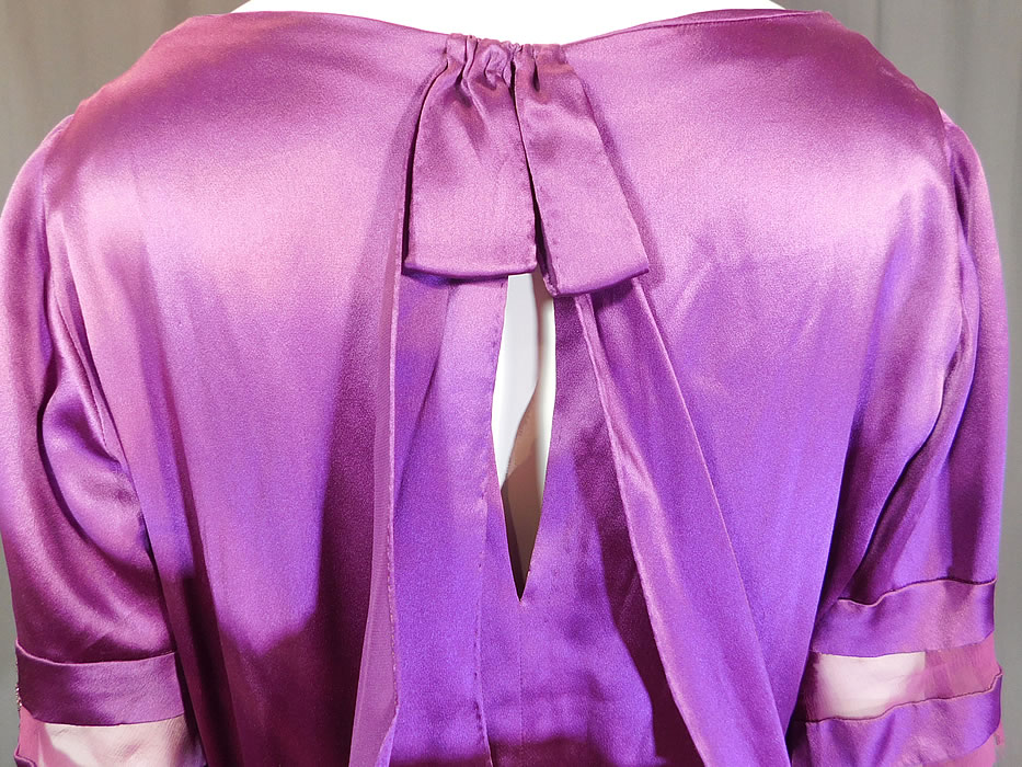 Vintage Art Deco Purple Silk Beaded Bell Sleeve Bias Cut Dress Evening Gown
The dress is a large size measuring 54 inches long, with a 42 inch bust, 36 inch waist, 48 inch hips and 15 inch back. 