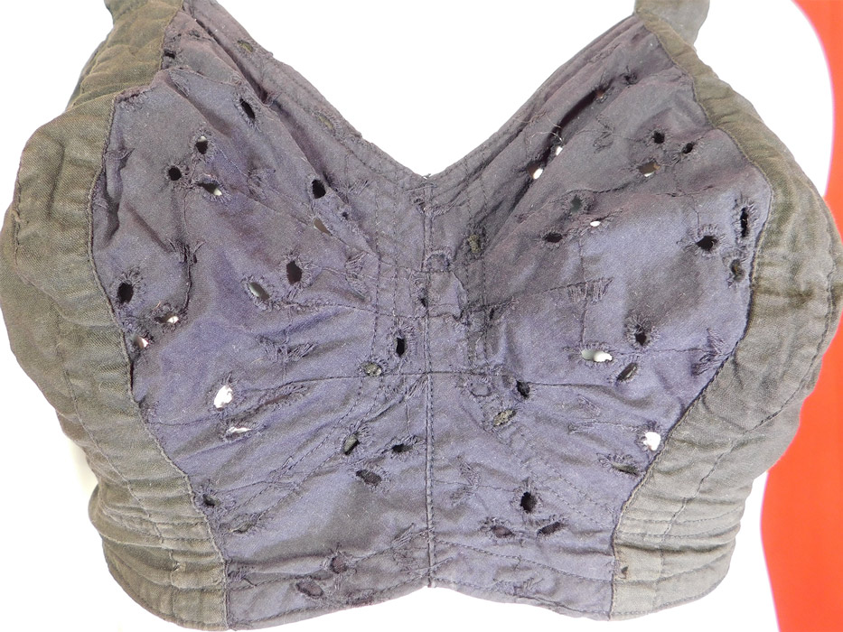 Vintage Lov-e Studios of Hollywood Brassiere Black & Blue Eyelet Corrective Bra
This retro rockabilly brassiere bra has soft fabric cups with no wires, unlined and has an adjustable back elastic strap hook closure. 