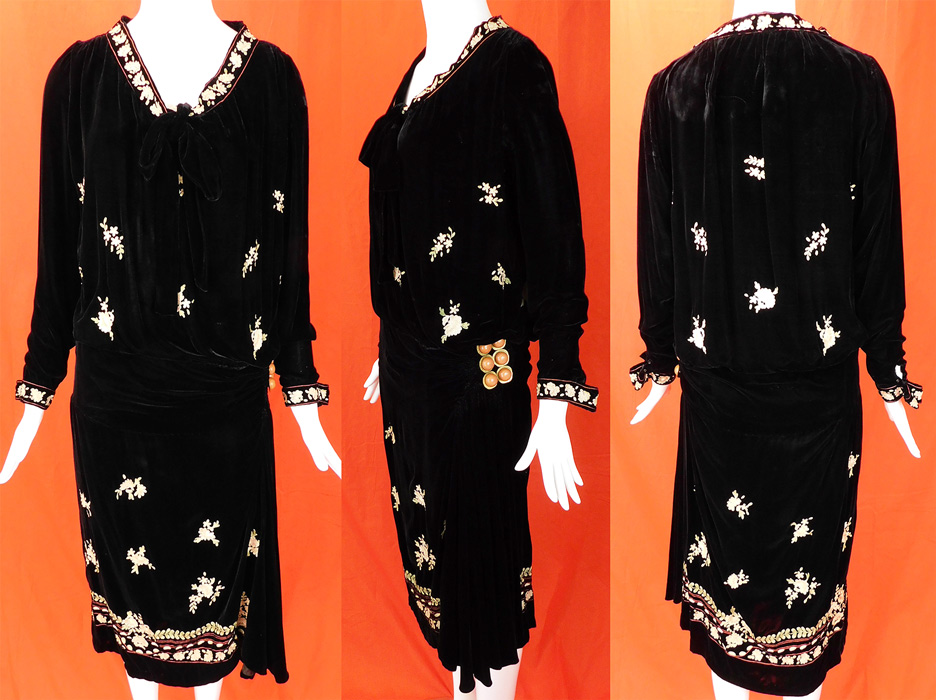 Vintage Black Velvet Pastel Chain Stitch Embroidered Flowers Drop Waist Dress
This vintage black velvet pastel chain stitch embroidered flowers drop waist dress dates from the 1920s.
