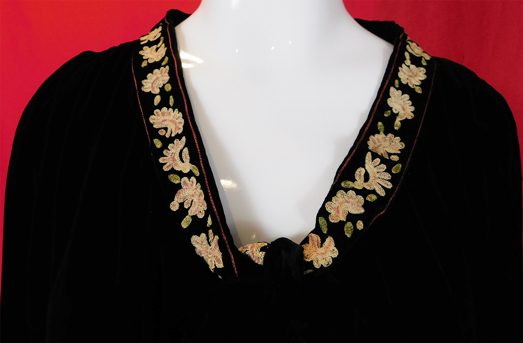 Vintage Black Velvet Pastel Chain Stitch Embroidered Flowers Drop Waist Dress
It is made of a black luxurious silk velvet fabric, with colorful pastel chain stitch hand embroidered flower trim accents and edging. 