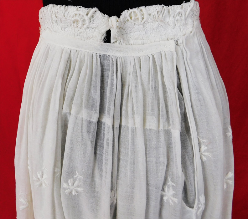 Edwardian Embroidered White Cotton Batiste Lace Layered Tea Length Skirt
The skirt measures 34 inches long, with a 22 inch waist and 40 inch hips. 