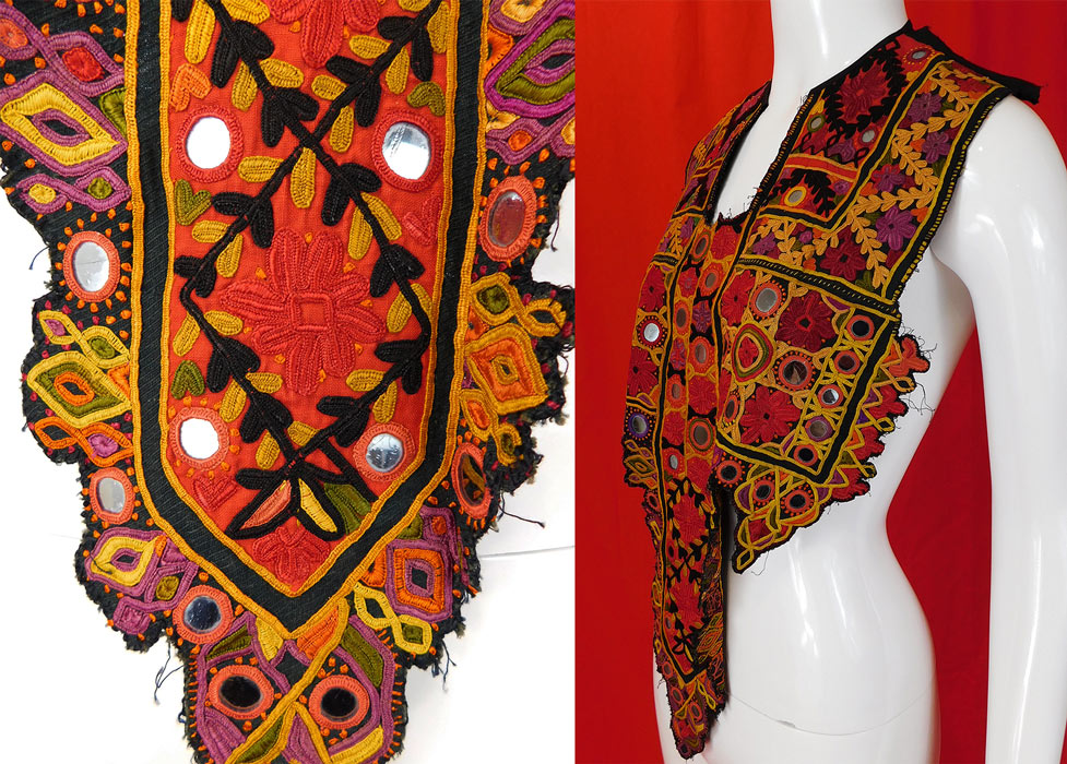 Vintage Indian Gujarati Kutch Work Ethnic Embroidered Mirror Boho Bib Top
The top measures 26 inches long in the front, 13 inches wide at the top, 16 inches wide mid top and 6 inches wide at the bottom front. 