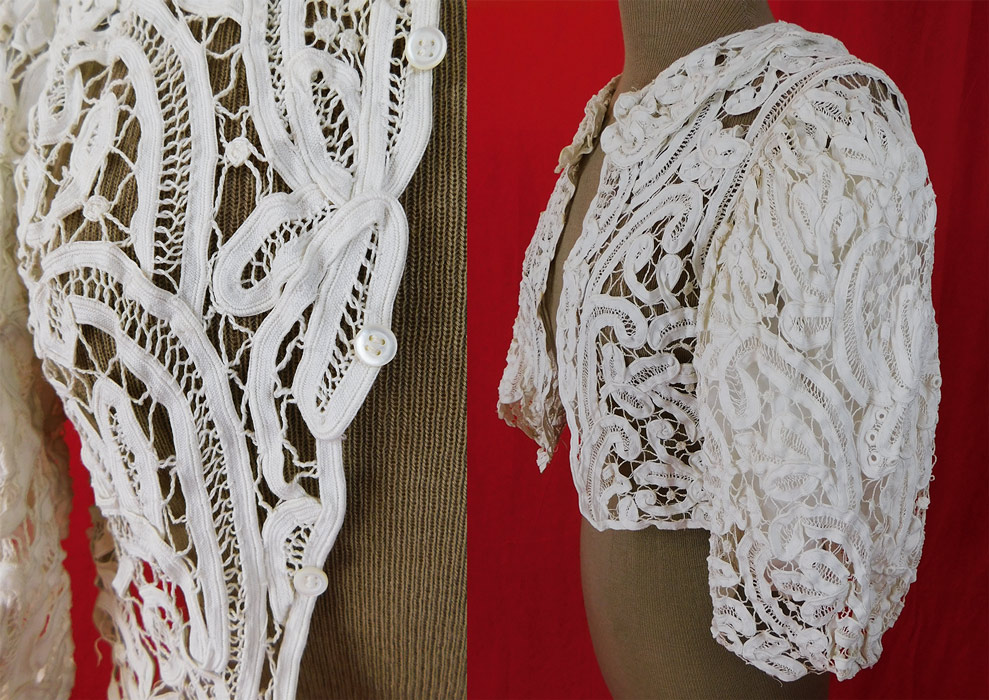 Victorian White Battenburg Tape Lace Short Crop Bodice Blouse Bolero Jacket
This lovely lace bodice blouse has a short cropped bolero jacket style with an open front, tiny mother of pearl button closures, 3/4 length full puffy sleeves, a rounded fold over collar and is sheer unlined. 