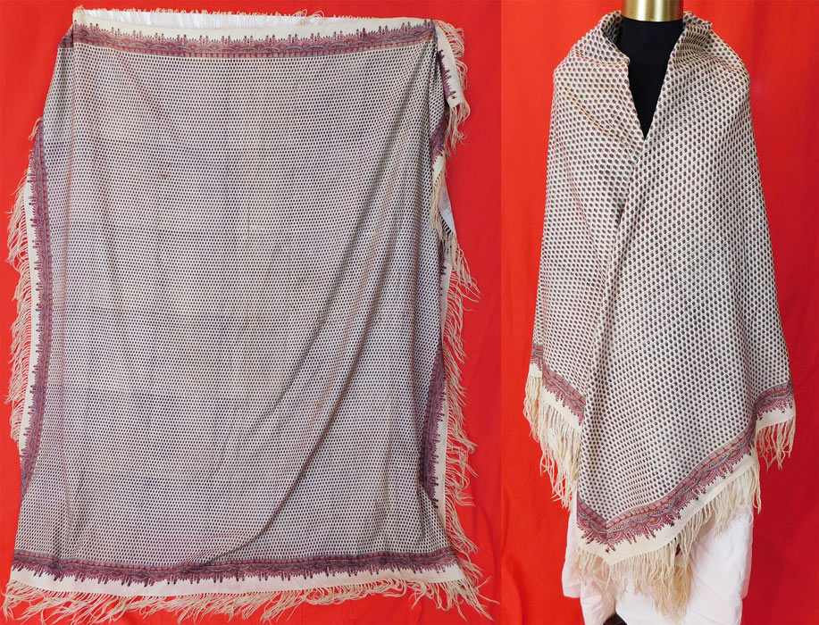 Victorian Antique Paisley Roller Print Wool Challis Fringed Norwich Shawl Scarf
This antique early Victorian era paisley roller print wool challis fringed Norwich shawl scarf dates from the 1850s. It is made of a soft light weight woven fine Kashmir challis wool weave drawloom fabric in an off white cream color with teal blue, periwinkle purple and red natural dye roller print paisley boteh tear drop floral garland design done along the border, circular style repeating pattern in the center, with a hand knotted cream wool fringe trim surrounding the entire shawl. 
