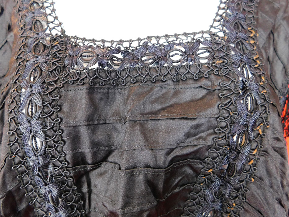 Victorian Black Silk Ruched Pleated Lace Fringe Trim Blouse Bodice Tabard Top
This antique Victorian era black silk ruched pleated lace fringe trim blouse bodice tabard top dates from 1900. It is made of a black silk fabric with ruched pleating details, black lace and silk fringe trim edging.