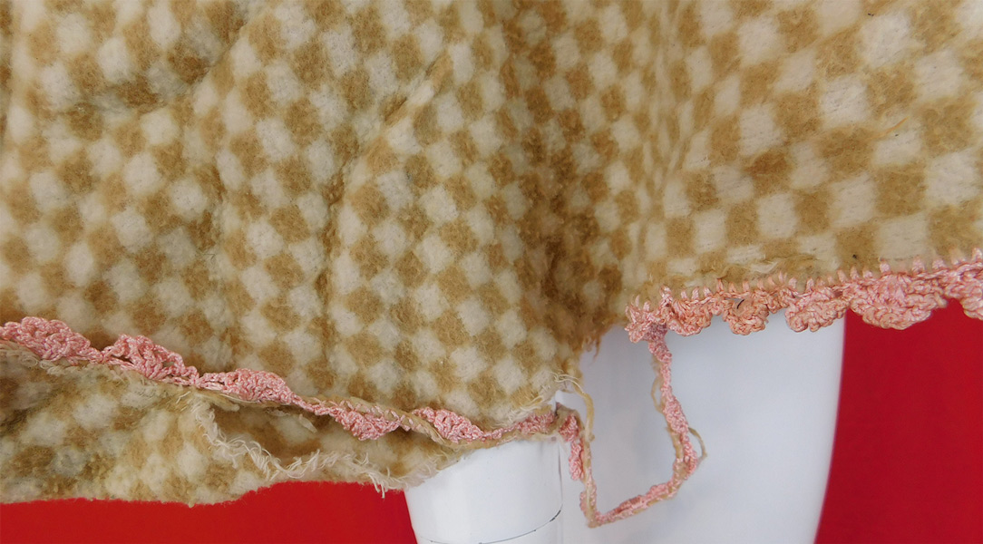 Victorian Beige & White Checked Flannel Morning Robe Bed Jacket Cape
It is in good as-is condition, has not been cleaned with a few faint small stains and some frayed loose crochet lace trim edging on the bottom sleeve cuff (see close-ups). This is truly a wonderful piece of antique Victorian boudoir wearable art! 