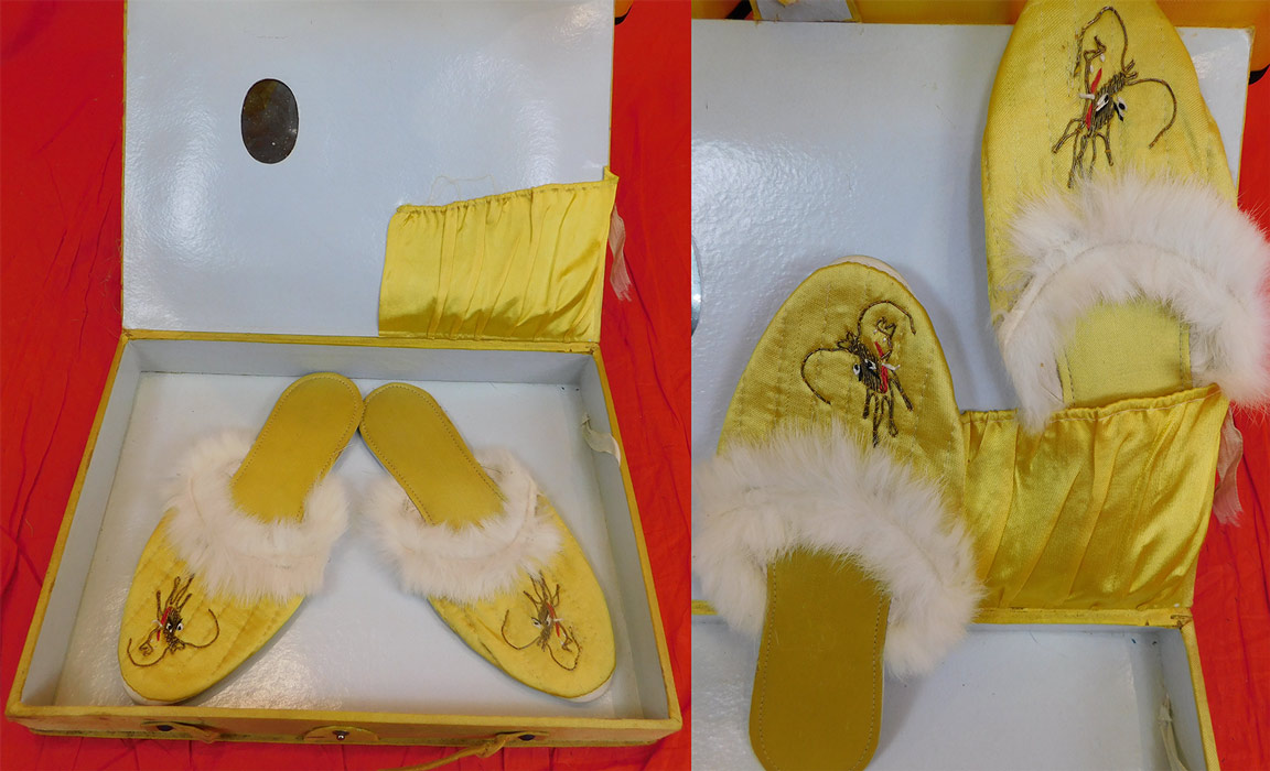 Vintage Japanese Yellow Nylon Gold Couching Embroidered Dragon Pajamas Set
The robe measures 48 inches long, with a 40 inch bust, 20 inch long sleeves and a 17 inch back. The slippers measure 9 1/2 inches long, 3 inches wide and the storage gift box is 14 by 10 inches. It is in good condition and appears to have never been worn. The storage gift box is in fair as-is condition with water spot stains, a broken strap and snap closure, fraying along the side edging and tarnish to the mirror. This is truly a wonderful piece of Japanese WWII era souvenir wearable art.