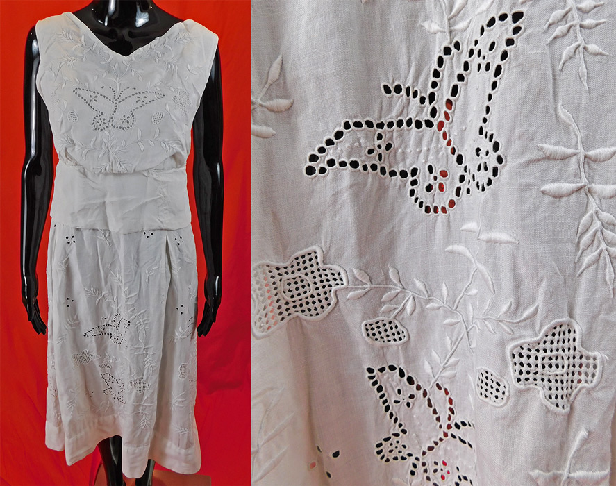 Vintage White Linen Embroidered Eyelet Drawn Cutwork Floral Butterfly Shift Dress
This lovely linen summer sun dress has a sleeveless shift style, with a wide belted waistband, cotton pique ribbed texture bottom hemline skirt, hook closures down the back and is lined on the front top only, the skirt is unlined. 