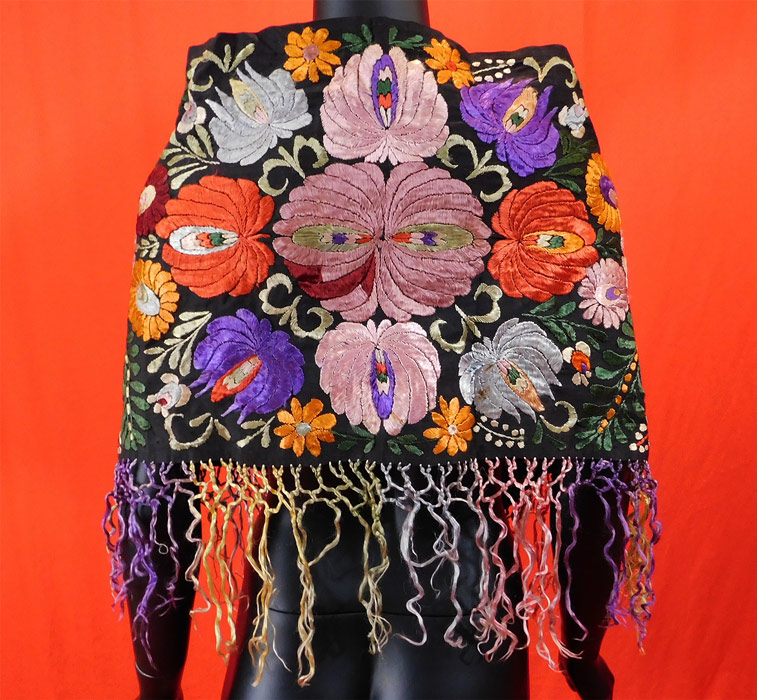 Vintage Matyo Hungarian Folk Embroidery Colorful Floral Shawl Stole Scarf
Hungary's tradition of peasant folk art embroidery dates back to the middle ages. Hungarian daughters learned to embroider at a very young age and a family's wealth was often measured or determined by the number of embroidered cloths they had.