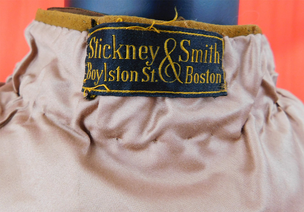 Victorian Brown Beige Wool Pinwheel Applique Silk Bow Trim Winter Cloak Cape
a "Stickney & Smith Boylston St. Boston" label sewn inside the neck. 