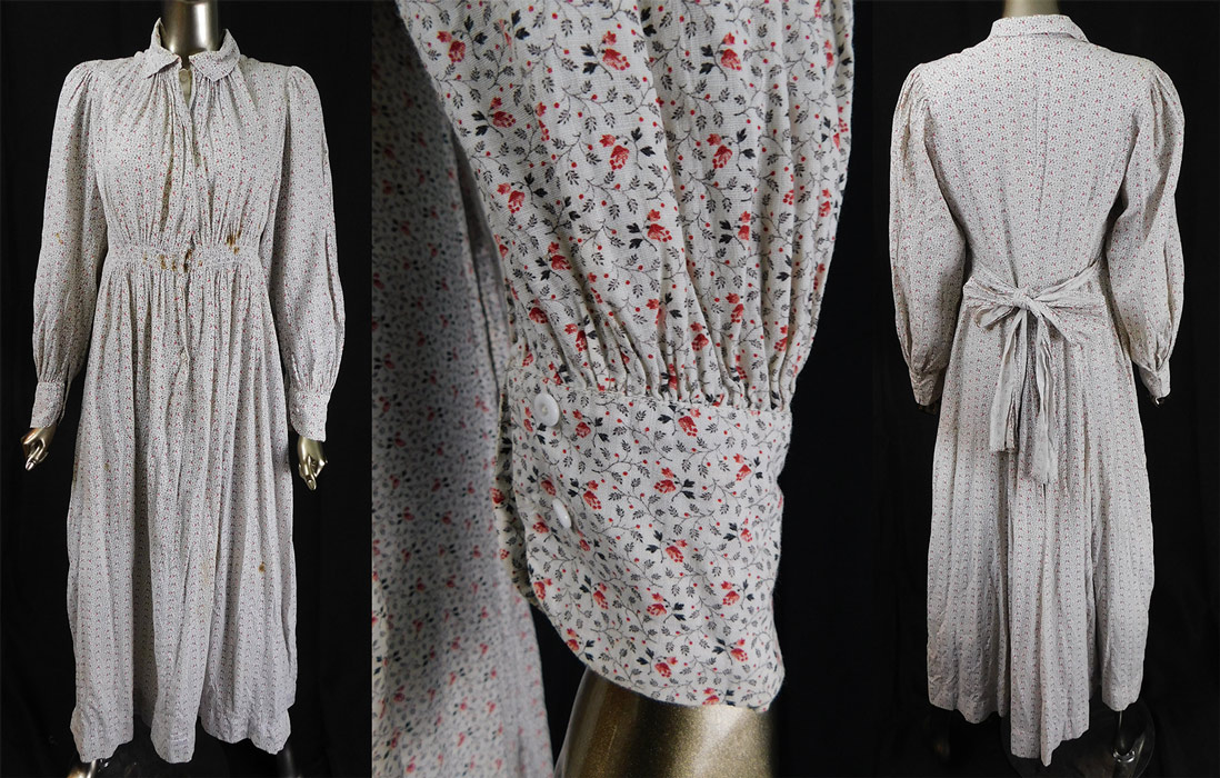 Victorian Black & White Red Roses Print Calico Wrapper Women's Workwear Dress
This women's workwear wrapper morning day dress has a long floor length style with an attached belted sash tie back, high neck fold over collar, gathered shoulders, long full sleeves with button cuffs, pleated back waist details, button closures on the front and a modesty button front insert camisole top lining the inside bodice, otherwise unlined. 