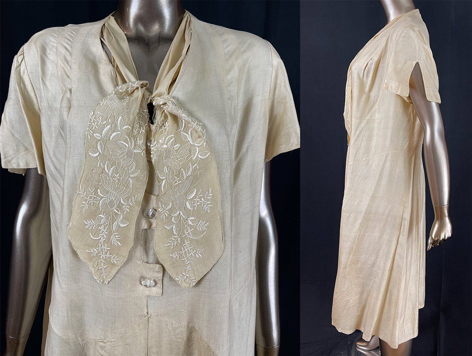 Vintage Pongee Raw Silk Drawn Thread Work French Knot Embroidery Tie Neck Dress
This stunning summer dress has a loose fitting drop waist style with an attached tie neck bow trim, scalloped front top with carved clear glass button trim, an embroidered pleated front skirt panel, short sleeves with side cutout cuffs and is unlined. The dress is a large size measuring 44 inches long, with a 46 inch chest, 40 inch waist, 54 inch hips and 17 inch back.
