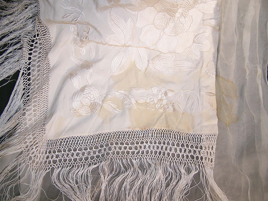 White Silk Embroidered Piano Shawl Wedding Dress Train Close up.