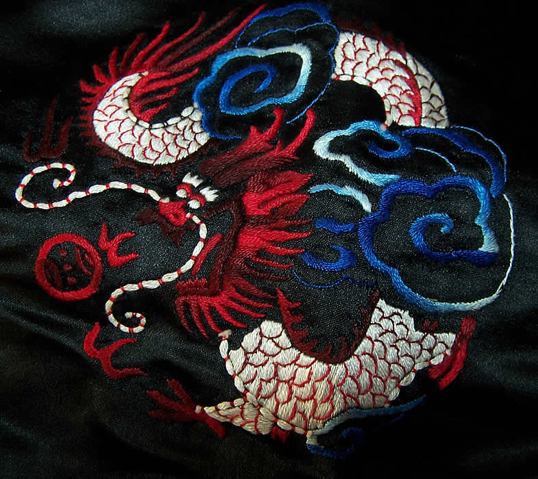 Dynasty Chinese Silk Embroidered Dragon Jacket close-up view.