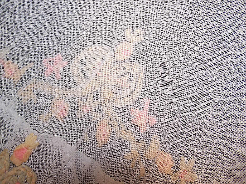 Vintage White Net Pastel Yarn Embroidered Ruffle Dress Gown & Slip some small holes on the front skirt clustered around one area close up.