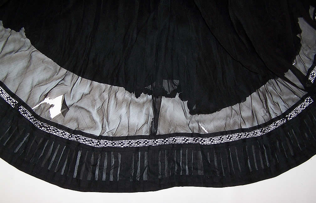 Victorian Sheer Black Weave Pleated Mourning Gown Dress Bodice Skirt Train some fraying holes on the sheer black silk insert along the back skirt train  close up.