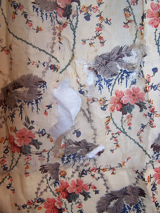 Victorian Floral Cherry Blossom Print Wool Challis Hoop Skirt Dressfrayed holes in the skirt close up.
