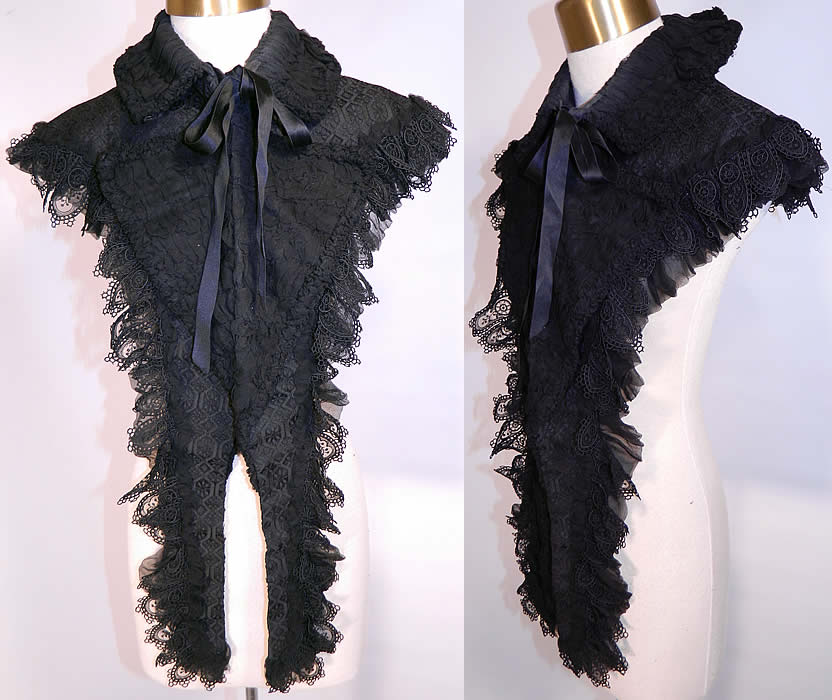 Victorian Antique Black Silk Lace Dolman Mantle Cape Capelet Collar. This antique Victorian era black silk lace dolman mantle mourning cape capelet collar dates from 1880. It is made of a black silk fabric covered with a sheer black lace and ruched gathered black silk chiffon overlay, with black lace scalloped trim edging.