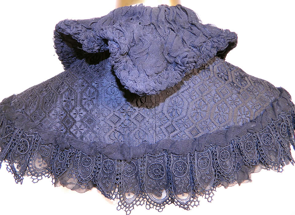 Victorian Antique Black Silk Lace Dolman Mantle Cape Capelet Collar. The cape measures 24 inches long in the front, with a 20 inch shoulder width.