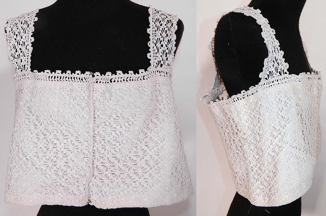 Edwardian White Cotton Crochet Lace Lingerie Camisole Top. This antique Edwardian era white cotton batiste crochet lace lingerie camisole top dates from 1915. It is made of a white cotton batiste fabric lining, with a white sheer crochet lace overlay.