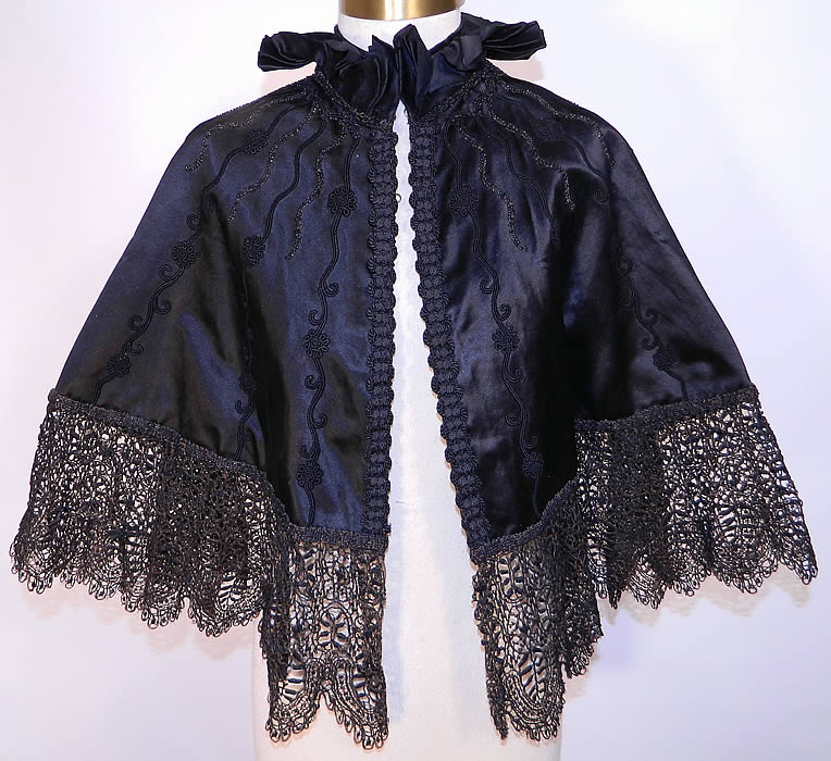 Victorian Black Silk Jet Beaded Lace Trim Evening Cloak Cape. This antique Victorian era black silk jet beaded lace trim evening cloak cape dates from 1880.
