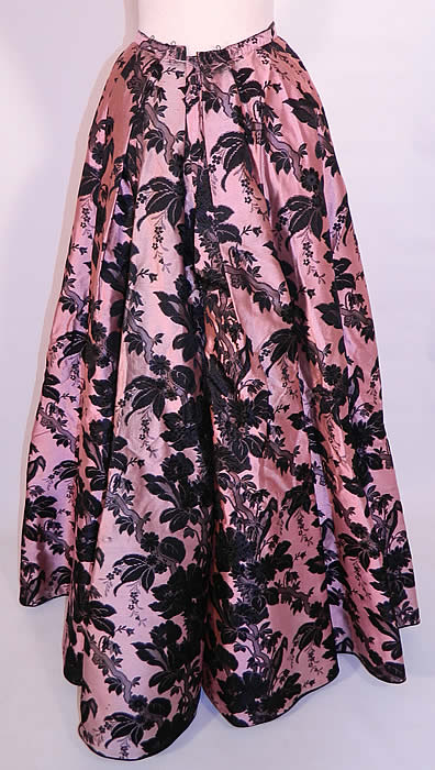 Victorian Pink & Black Floral Silk Damask Brocade Ball Gown Bustle Skirt. It is in excellent condition and looks to have never been worn. 