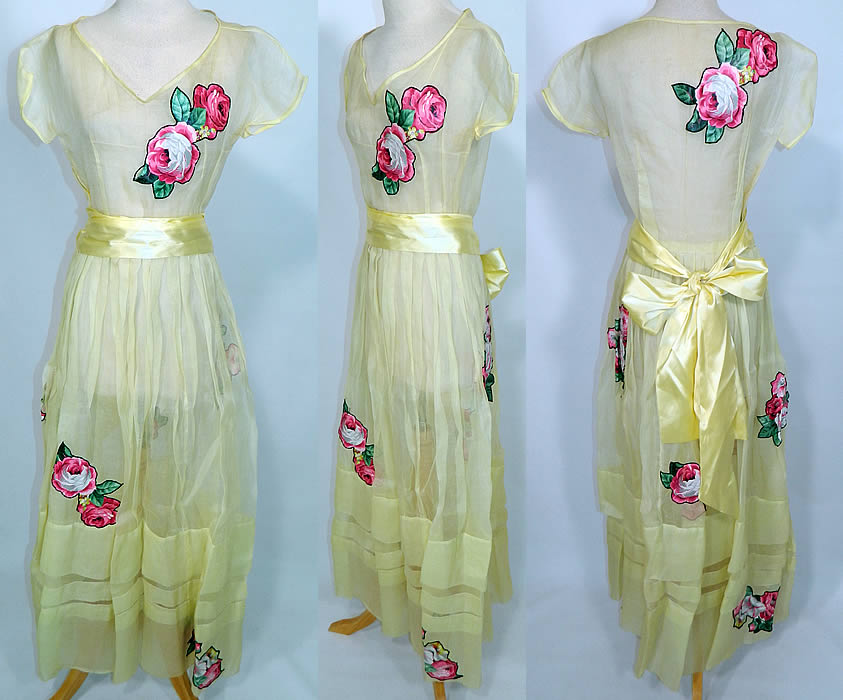 Vintage Yellow Organdy Pink Roses Chintz Applique Belted Dress. This vintage yellow organdy pink roses chintz applique belted dress dates from the 1940s. It is made of a sheer pale lemon yellow organdy fabric, with colorful pink roses printed chintz fabric applique's stitched onto it.