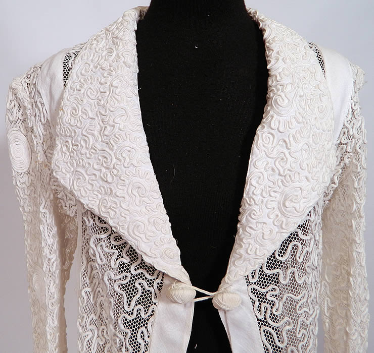 Edwardian White Linen Net Soutache Work Walking Suit Dress Jacket & Skirt. This stunning summer two piece walking suit includes a long duster style coat jacket, with an open front, toggle loop button closure, lapel collar, long full sleeves, rolled sleeve cuffs and high side slits. It is sheer and unlined.