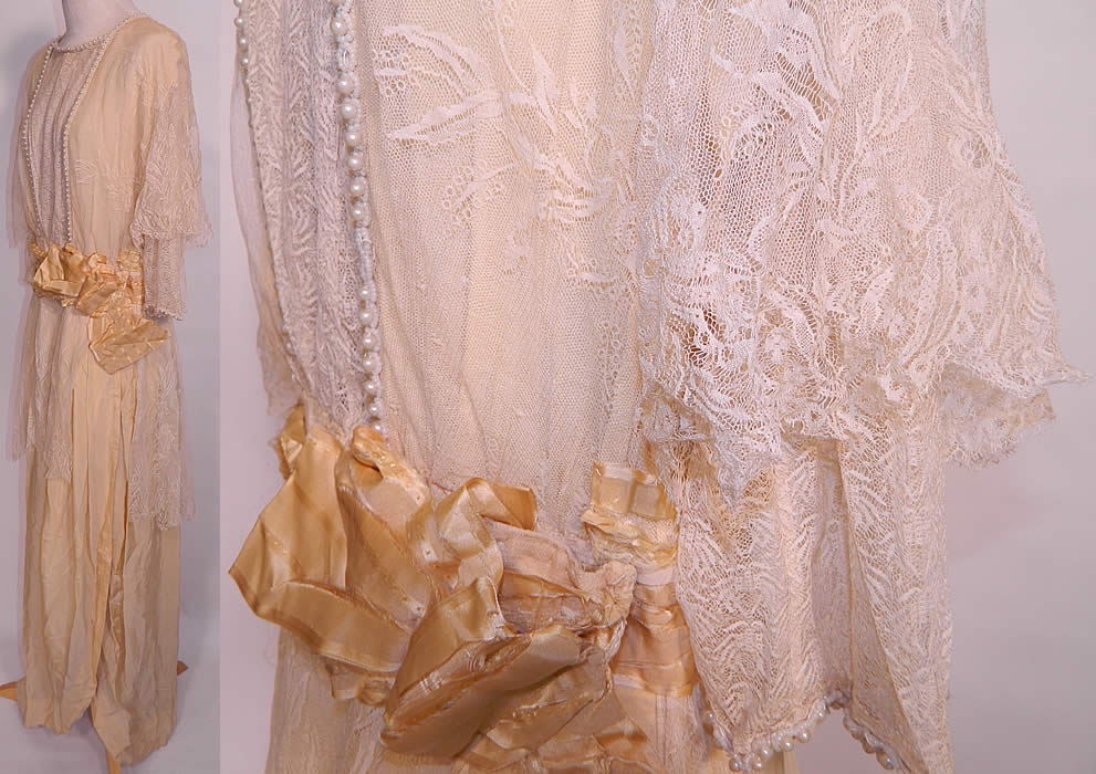 Edwardian Titanic Cream Silk Lace Pearl Beaded Wedding Gown Dress. The dress measures 58 inches long, with 36 inch hips, a 26 inch waist and 36 inch bust. It is in good condition, with only the cream silk ribbon sash belt around the waist frayed, shattered and would need replacing.