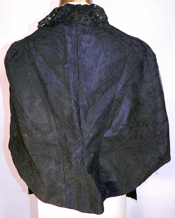 Victorian Black Chantilly Lace Mourning Mantle Cape Dolman Capelet. The cape measures 22 inches long in the front, 19 inches long in the back, with a 34 inch bust and 15 inches across the shoulders. 