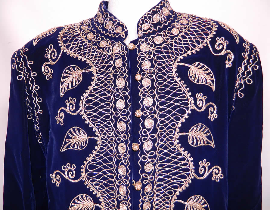 Vintage Adonis Lebanon Blue Velvet Gold Embroidered Boho Kaftan Robe Coat.The kaftan measures 55 inches long, with 44 inch hips, a 42 inch waist, 38 inch bust, 16 inch back and 21 inch long sleeves. It is in good condition. This is a wonderful piece of wearable Lebanese textile art!