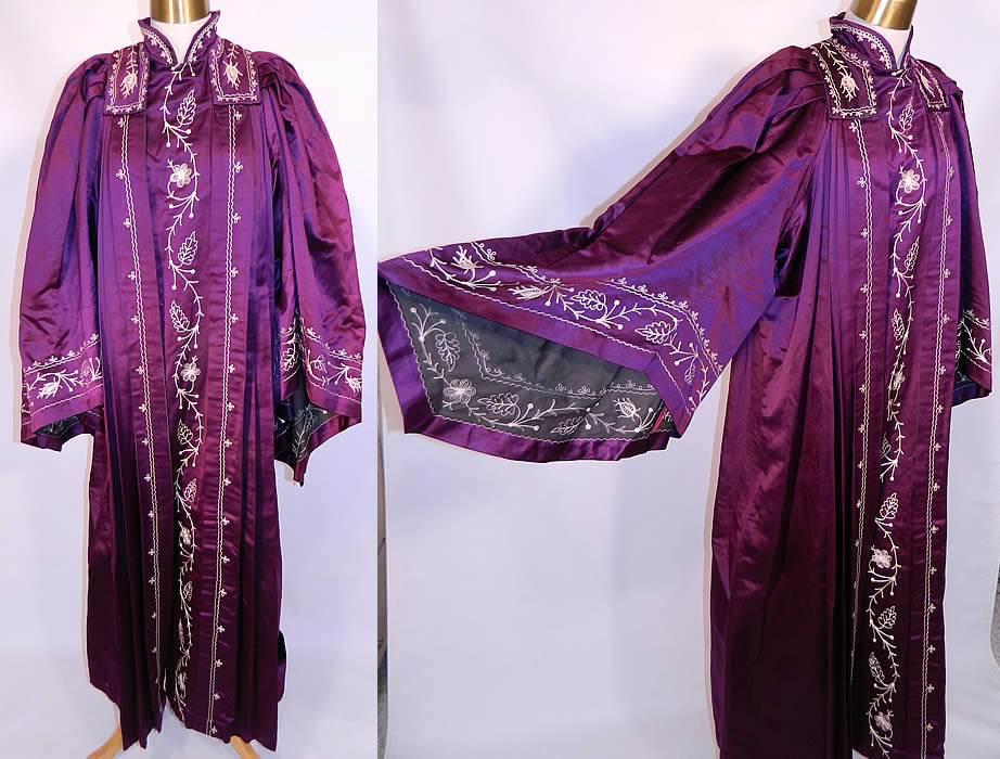 Vintage Henderson Ames Co Regalia Purple Silk Ceremonial Robe Gown. It is made of a royal purple color silk satin fabric, with decorative white stitching embroidery work done in a floral vine leaf design. 