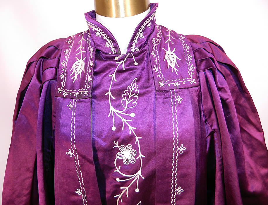 Vintage Henderson Ames Co Regalia Purple Silk Ceremonial Robe Gown. This beautiful robe gown is loose fitting, a long floor length, with a high collar neckline, gathered shoulders, long full wide kimono style sleeves, a pleated back drape, fully lined and hook closures on the front.
