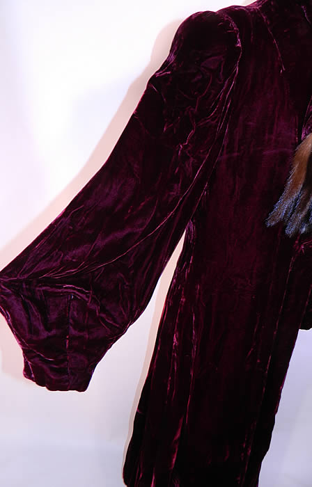 Vintage Burgundy Silk Velvet Mink Fur Tails Scarf Evening Coat Winter Jacket.This elegant evening coat is a long floor length, with a fitted style, gathered shoulders, broad shoulder padding, long full bishop sleeves with fitted cuffs, fully lined, an attached neck collar scarf wrap and velvet button closure. 