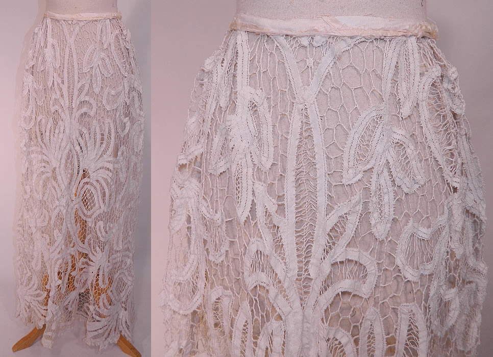 Edwardian Antique White Battenburg Tape Lace Bridal Wedding Skirt Train. This Edwardian era antique white battenburg tape lace bridal wedding skirt train dates from 1905. It is hand made of a white filmy linen stitch, fine tape lace, with button hole stitching, connecting brides and bars done in a floral, leaf, scrolling, spiral design.