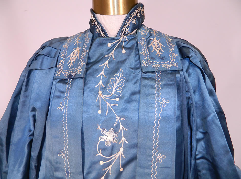 Vintage Henderson Ames Co Regalia Blue Silk Ceremonial Robe Gown. This beautiful robe gown is loose fitting, a long floor length, with a high collar neckline, gathered shoulders, long full wide bell shape kimono style sleeves, a pleated back drape, fully lined and hook closures on the front. 