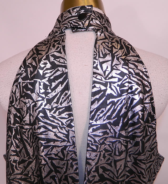 Vintage Tadmor For Daniel D'niver Made in Israel Silver & Black Painted Leather Halter Dress. The dress measures 50 inches long, with 40 inch hips, a 36 inch waist and 38 inch bust. It is in good condition and quality made. This is truly an exceptional quality made piece of wearable art! 