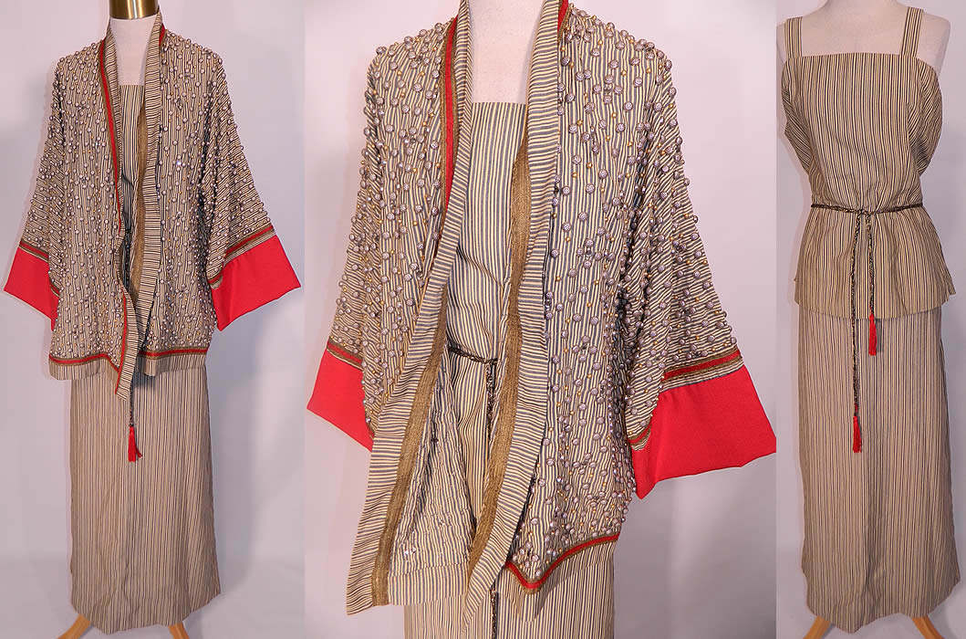 Vintage Mr John I Magnin & Co Silk Stripe Dress & Beaded Kimono Jacket. There is a long sleeveless shell top blouse, with long floor length maxi skirt, both with zipper closures, a gold rope tie belt with red tassel ends and a loose fitting kimono style jacket completely covered with silver, gold, rhinestone studded beads, red silk, gold metallic lam&eacute; trim edging and has an open front with no closure.