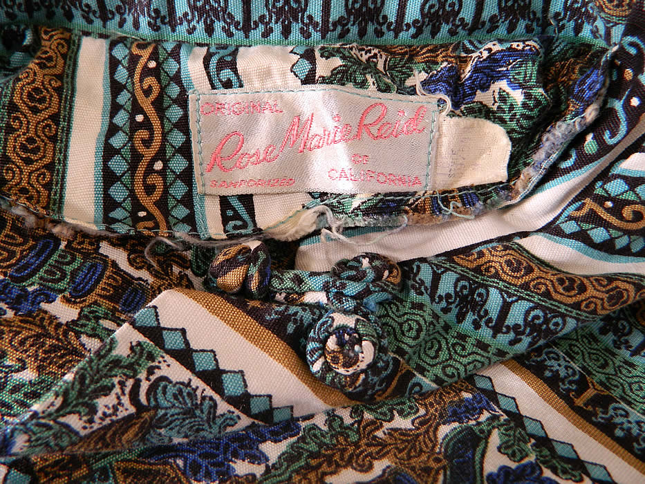 Vintage Rose Marie Reid Cotton Print Playsuit Swimsuit Coverup Top. It is lined inside the bra cup lining and has an "Original Rose Marie Reid of California" designer label.