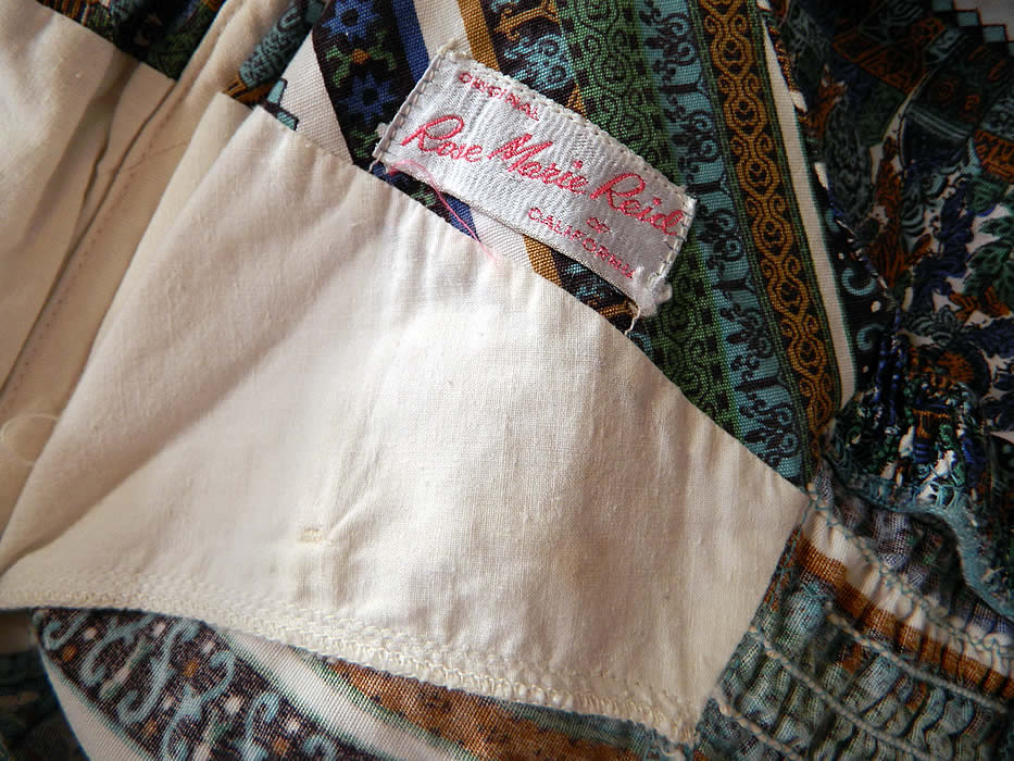 Vintage Rose Marie Reid Cotton Print Playsuit Swimsuit Coverup Top. It is lined inside the bra cup lining and has an "Original Rose Marie Reid of California" designer label.