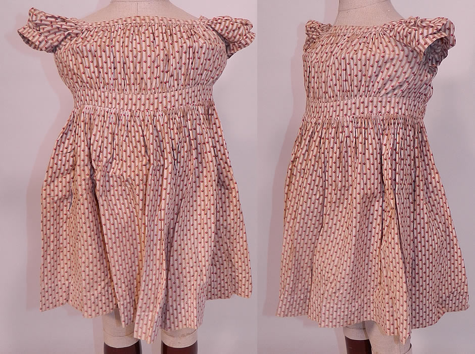 Victorian Childs Chintz Calico Cotton Stripe Print Girls Dress. This antique Victorian era child's chintz calico cotton stripe print girls dress dates from 1850. 