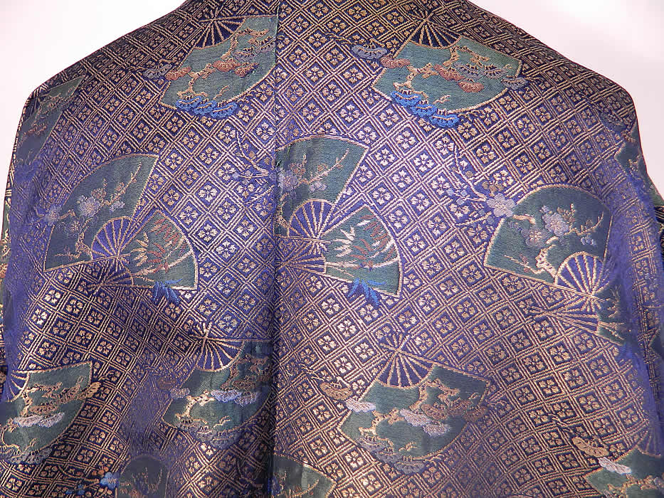 Vintage Japanese Geisha Gold Lam&eacute; Silk Brocade Fan Kimono. This fabulous formal Japanese senior geisha kimono is fully lined in a reddish orange silk fabric with a rolled padded hem and open front with no closure. The kimono measures 70 inches long, with 39 inch long furisode kimono sleeves and is 49 inches across the shoulders.