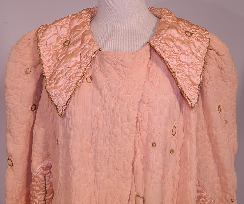 Vintage Harrods Pink Silk Quilted Gold Trim Stitched  Peignoir Robe Dressing Gown. This lovely lingerie negligee peignoir robe dressing gown is a long floor length, with a wide collar, snap closure on neck, gathered shoulders with slight padding, long full bishop style sleeves with fitted cuffs and is fully lined. 