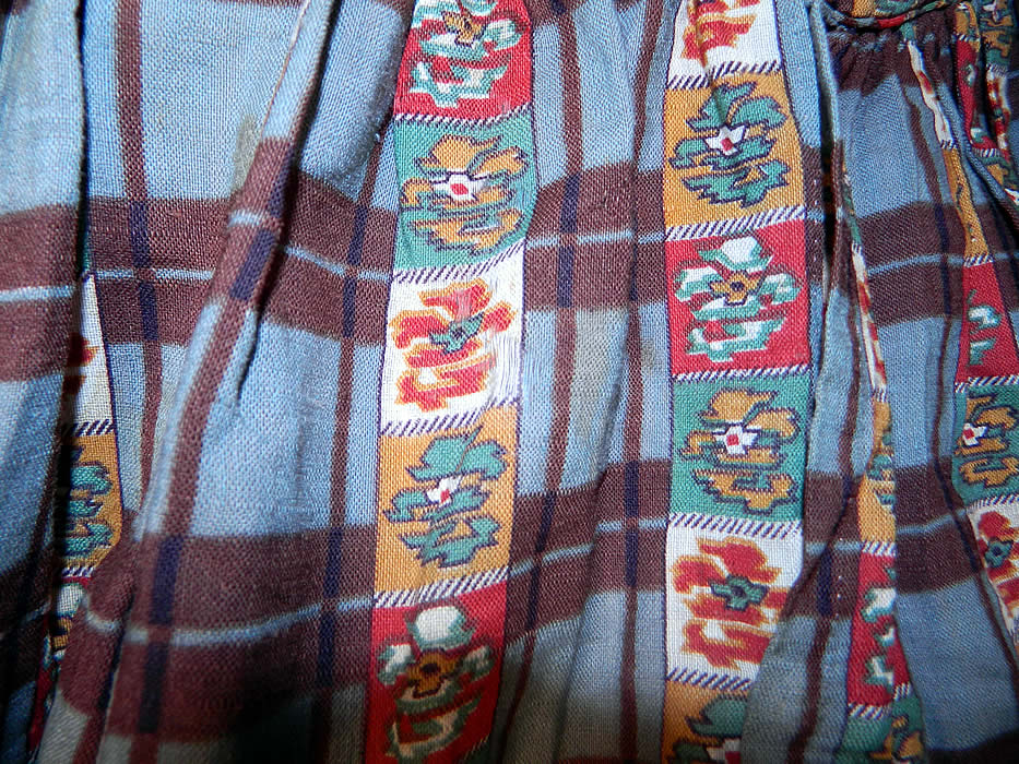 Victorian Civil War Floral Paisley Plaid Print Wool Challis  Hoop Skirt Dress. It is in good condition, with only a small fray on the front skirt waist.
