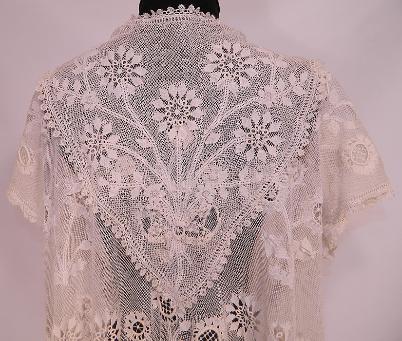 Edwardian Antique  Limerick Lace White Embroidered Net Long Coat Jacket. This lovely lace long floor length coat jacket has an open front with no closure, is sheer, unlined, with short cap sleeves and large kerchief triangle shape shawl collar on back. 