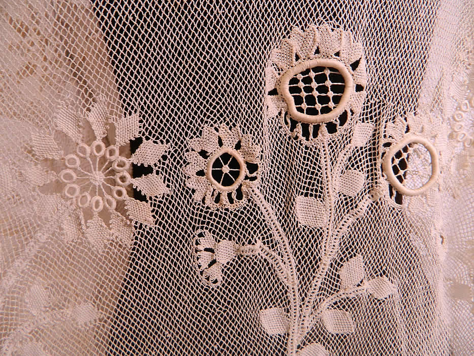 Edwardian Antique  Limerick Lace White Embroidered Net Long Coat Jacket. It is in excellent condition. This is truly an extraordinary piece of wearable antique lace art!  
