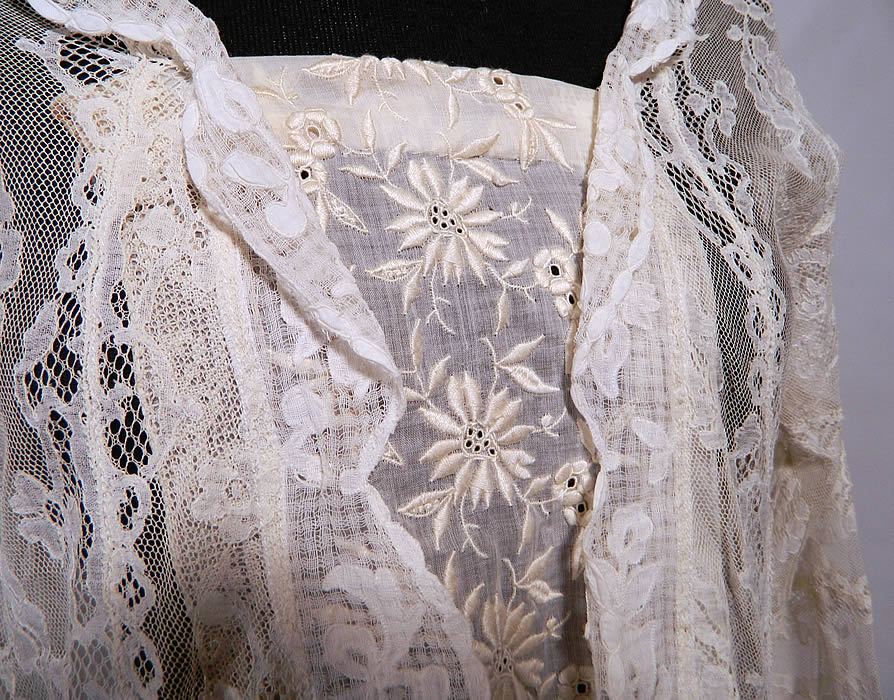 Vintage Normandy Lace White Embroidered Batiste Applique Drop Waist Dress. There is valenciennes French bobbin lace and a fine windowpane mesh fabric with white cotton appliques sewn onto it.