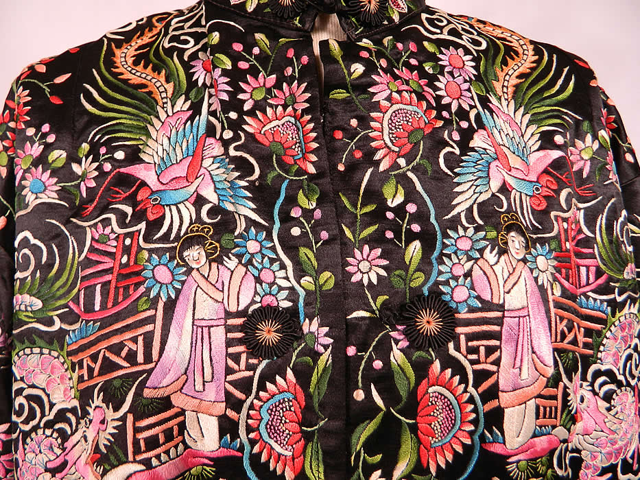Vintage Chinese Dragon & Phoenix Peking Knot Silk Embroidered Figural Jacket. There is a lavishly lush floral foliage, figural Chinese women, pagoda temples, dragons and phoenix bird designs completely covering the fabric. The phoenix and dragon represent the bird and animal kingdoms and are a symbol of the entire natural world. 