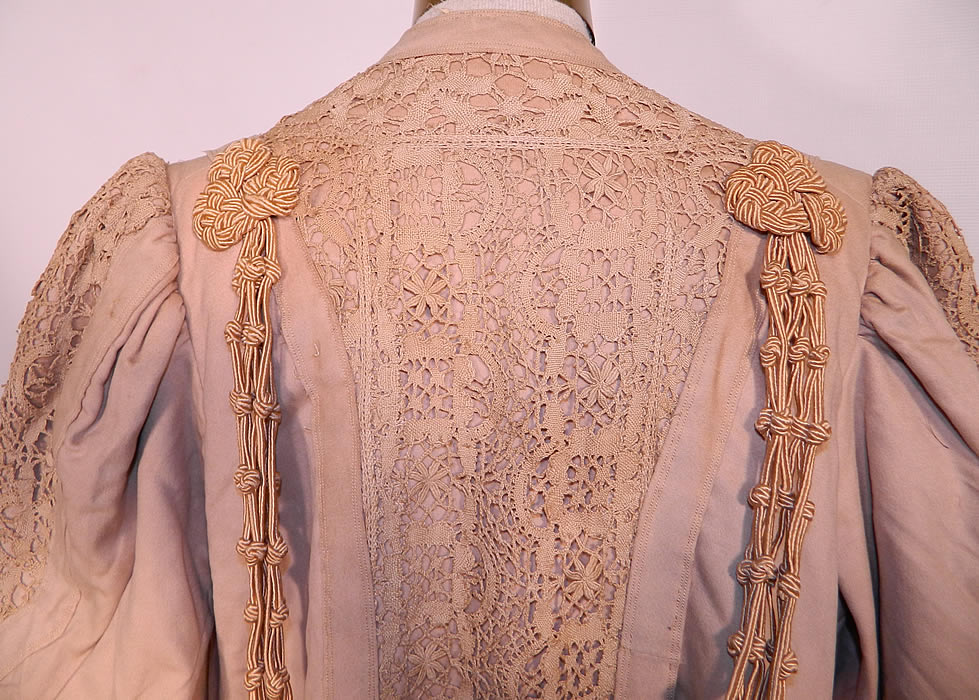 Edwardian Ecru Camel Color Wool Lace Tassel Trim Traveling Coat. It is in good condition, has not been cleaned and has a few tiny moth holes and faint age spot stains. This is truly an exceptional piece of wearable antique textile art! 