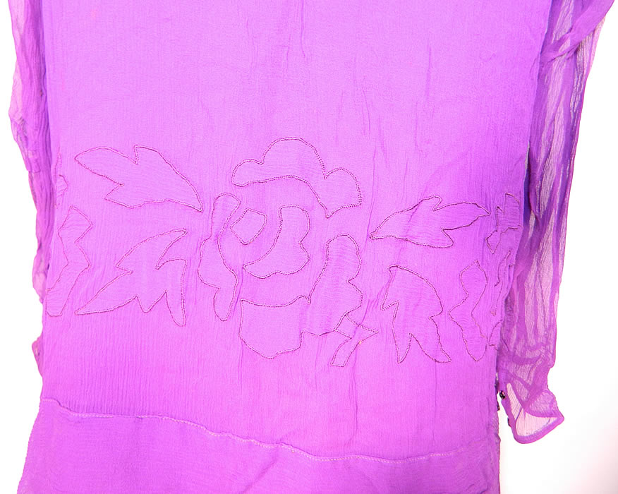 Vintage Violet Purple Silk Chiffon Floral Applique Flapper Dress & Slip. The dress measures 44 inches long, with 40 inch hips, a 38 inch waist, 34 inch bust and 22 inch long sleeves.